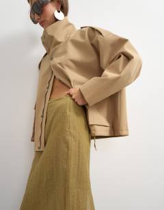 Model wearing Sheer maxi skirt in khaki