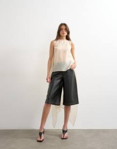 Model wearing Sheer organza drape tunic top in ecru