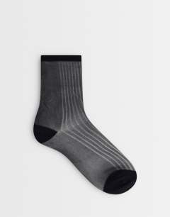 Sheer ribbed sock in black
