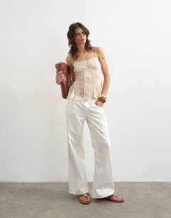 Model wearing Sheer seam detail cami top in cream