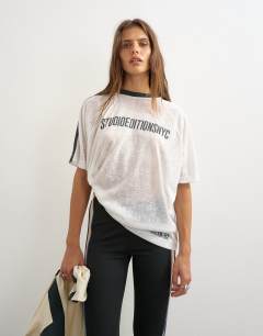 Model wearing Sheer slub graphic t-shirt in ecru