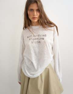 Sheer slubby graphic 'NYC' long sleeve top in ecru