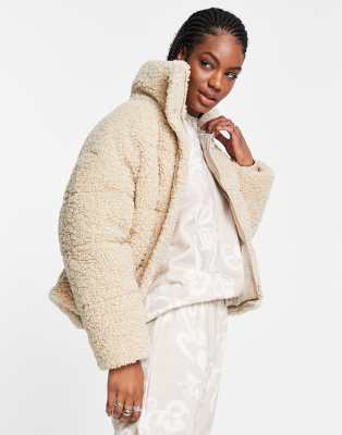 cream colored puffer jacket