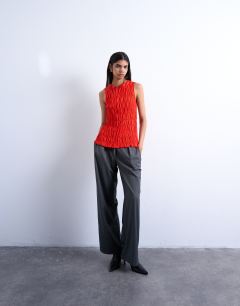 Model wearing Shirred tank top in red