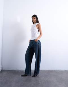 Model wearing Shirred tank top in white