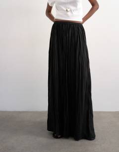 Model wearing Shirred waist crinkle full circle skirt in black