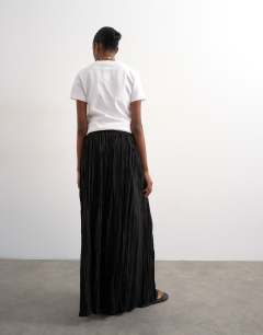 Model wearing Shirred waist crinkle full circle skirt in black
