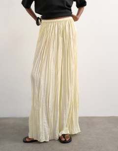 Model wearing Shirred waist crinkle full circle skirt in natural