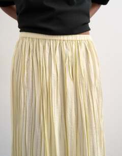 Model wearing Shirred waist crinkle full circle skirt in natural