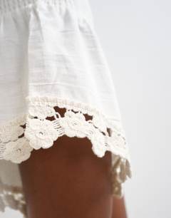 Model wearing Shirring detail knicker short in ecru