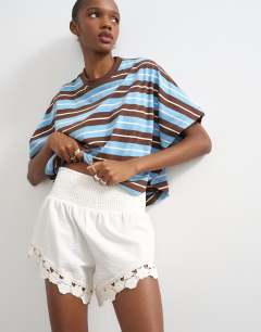 Model wearing Shirring detail knicker short in ecru