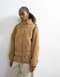 Model wearing Short cotton belted bomber jacket in tan