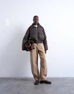 Model wearing Short rib collar puffer bomber jacket in chocolate