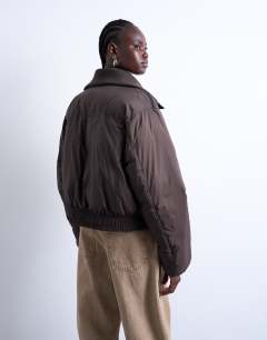 Model wearing Short rib collar puffer bomber jacket in chocolate