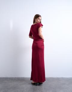 Model wearing Short sleeve asymmetric slinky maxi dress in red