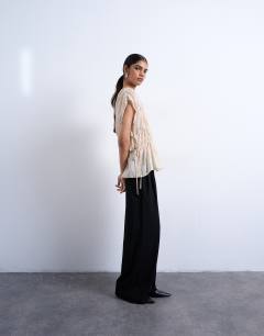 Model wearing Short sleeve channelled tie side top in ecru