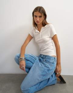 Model wearing Short sleeve henley in white