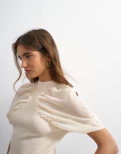 Model wearing Short sleeve sheer gathered top in ivory