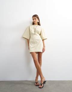 Short sleeve slash neck structured mini dress in off white