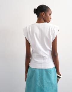 Model wearing Shoulder pad t-shirt in white