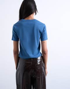 Model wearing Shrunken everyday tee in air force blue