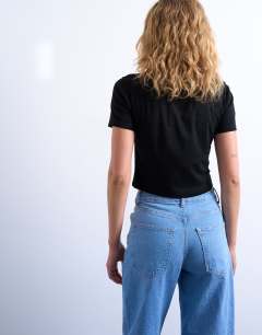 Model wearing Shrunken everyday tee in black