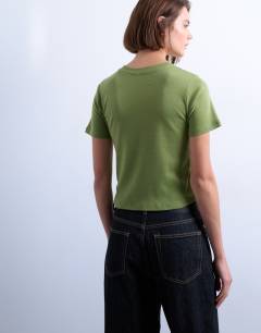Model wearing Shrunken everyday tee in green