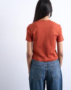 Model wearing Shrunken everyday tee in rust
