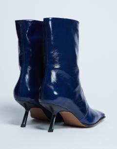 Model wearing Sienna Premium leather square toe mid heel boot in navy