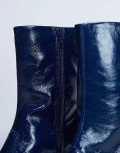 Model wearing Sienna Premium leather square toe mid heel boot in navy