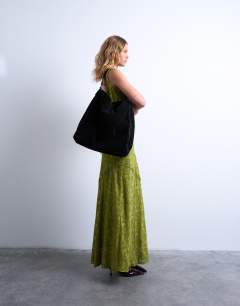 Model wearing Sienna real leather shoulder bag in black