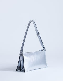 Model wearing Simone shoulder bag in silver