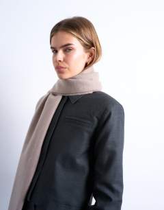 Model wearing Simone supersoft blanket scarf in taupe