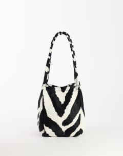 Singer medium real hair on leather shoulder bag in zebra