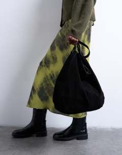 Model wearing Siobhan real suede leather shoulder bag in black