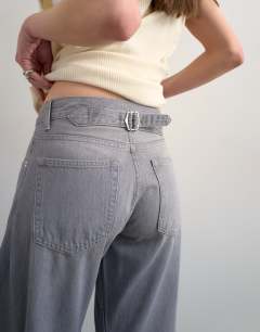 Model wearing Skewed boyfriend jean in grey