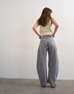 Model wearing Skewed boyfriend jean in grey