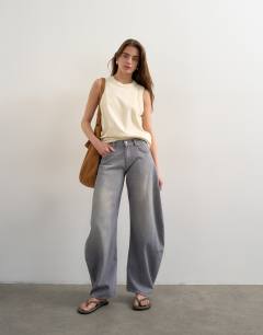 Model wearing Skewed boyfriend jean in grey