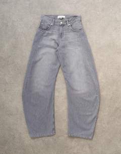 Model wearing Skewed boyfriend jean in grey