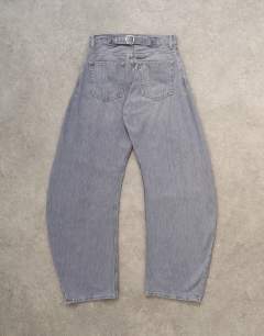 Model wearing Skewed boyfriend jean in grey
