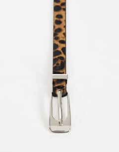 Model wearing Skinny hair on real leather belt in leopard print