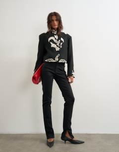 Skinny jean with side split in clean black