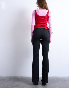 Model wearing Skinny rib flared trouser in black
