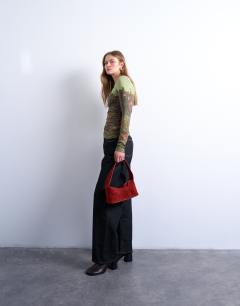 Model wearing Slash neck abstract placement print microfibre top in green