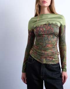 Model wearing Slash neck abstract placement print microfibre top in green