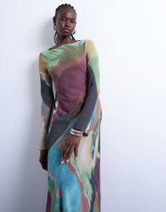 Model wearing Slash neck chiffon maxi dress in abstract print