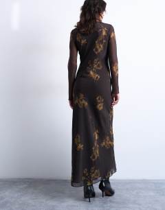 Model wearing Slash neck chiffon maxi dress in brown and lime floral print
