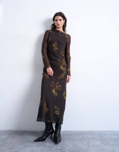 Model wearing Slash neck chiffon maxi dress in brown and lime floral print