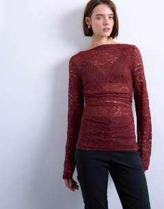 Model wearing Slash neck hitch side lace top in dark red