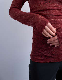 Model wearing Slash neck hitch side lace top in dark red
